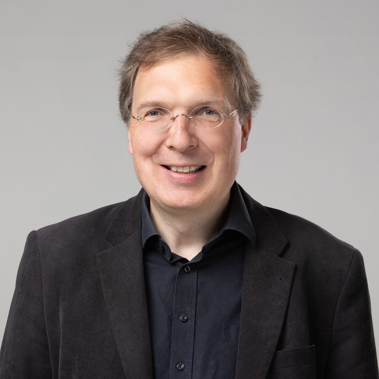 Dr. Daniel Gardemin, lächelnd.