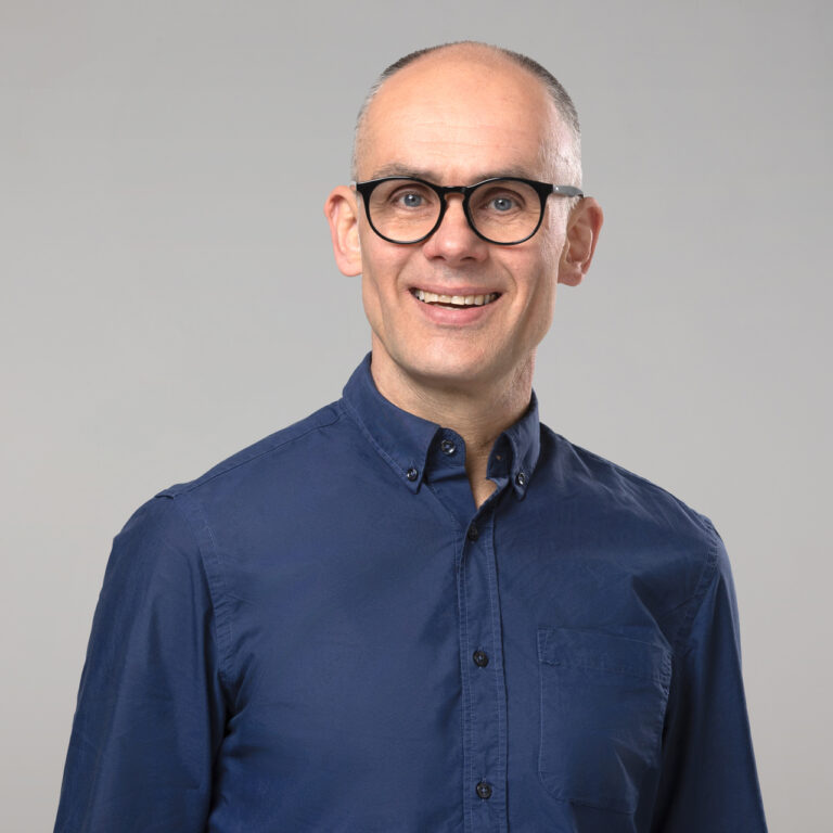 Michael Rinker, lächelnd.