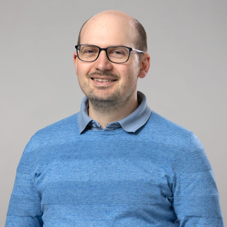 Norbert Gast, lächelnd.